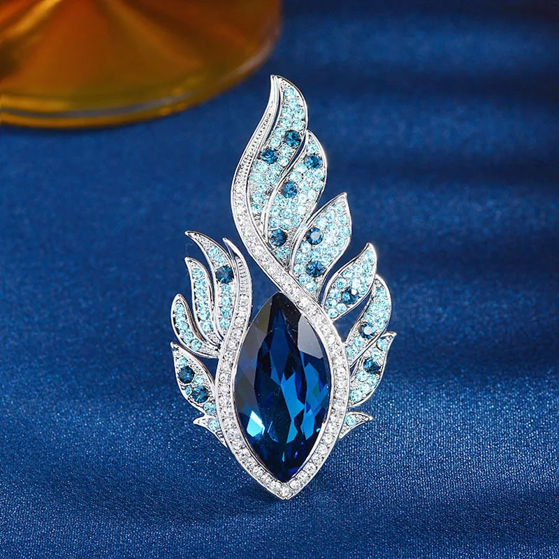 OKILY Exquisite Angel Phoenix Feather Imiation Crystal Eye Broochpins Slightly Inlaid Zircon Personality Women Corsage Accessori