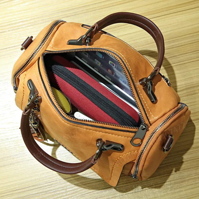 Yao dong Retro สไตล์ไหล่กระเป๋าผู้หญิง PU หนังบอสตัน Crossbody กระเป๋ายุโรปอเมริกาแนวโน้มแฟชั่นผู้หญิงหรูหรากระเป๋าถือ LZF