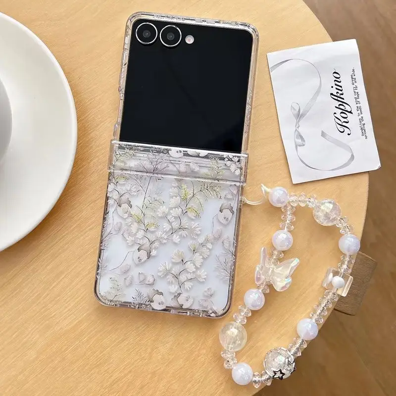 Minimal Elegant Creamy Flower Printed Clear Phone Case for Samsung Galaxy Z Flip 7-3 Pearl Crystal Bead Strap Protective Cover