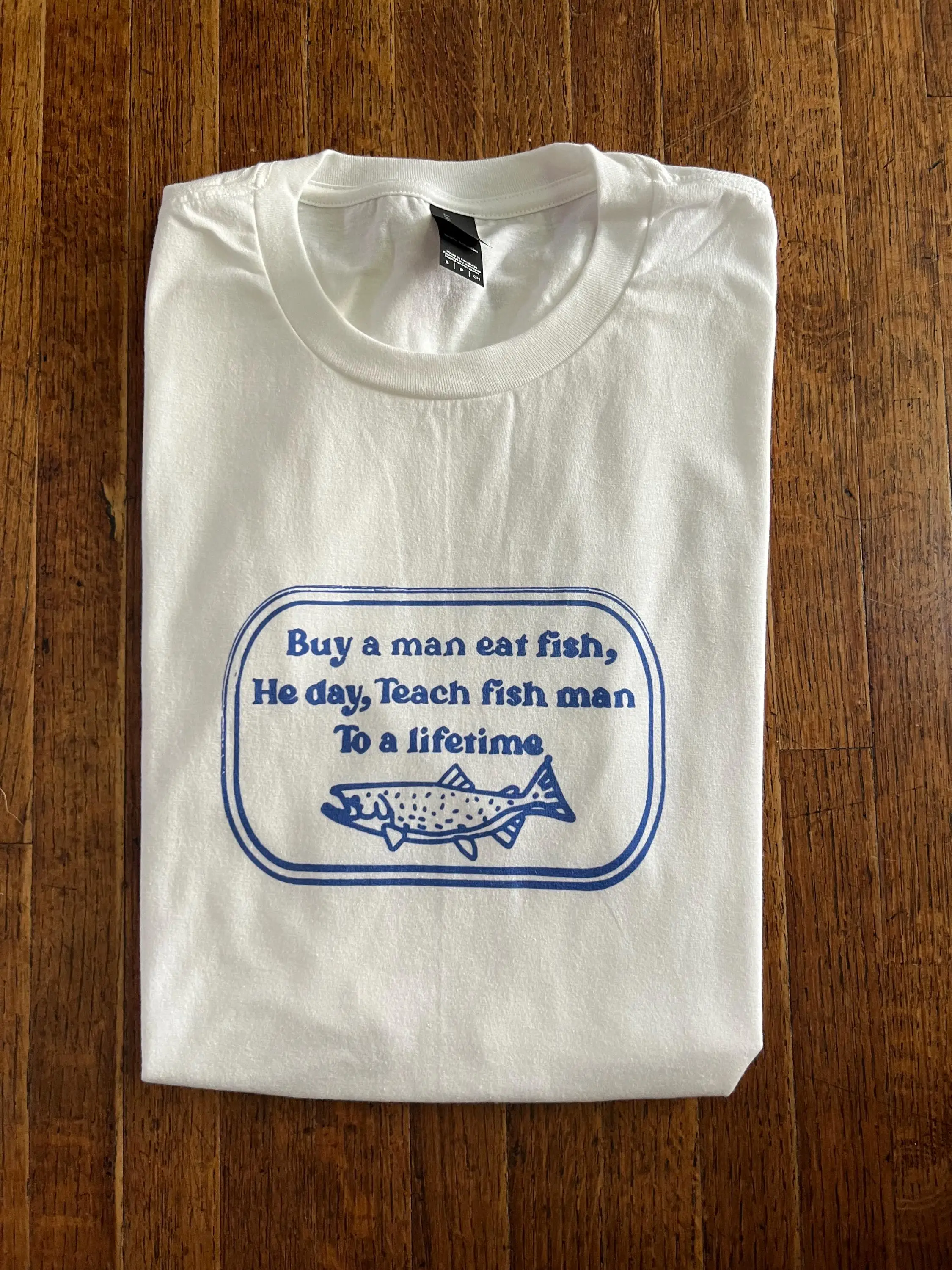 Buy A Man Eat Fish, He Day, Teach Fish Man To A Lifetime Unisex T-Shirt