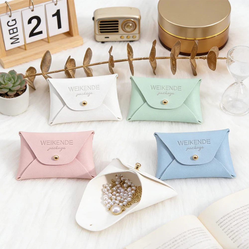 

7x5cm Portable PU Jewelry Storage Bag Custom Logo Leather Travel Organizer Case Keychain Earrings Ring Display Packaging Pouches