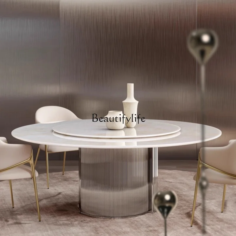 

04Italian minimalist light luxury natural luxury stone dining table modern simple large apartment round table