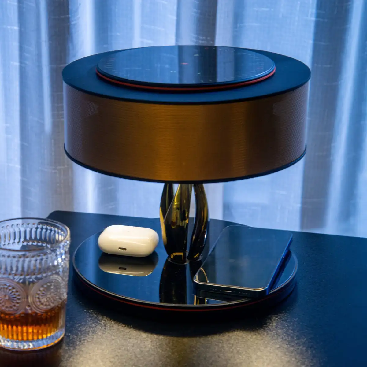 Beside the table lamp with TWS BT speaker and wireless charging in the Nordic living room, a lightweight luxury music lamp