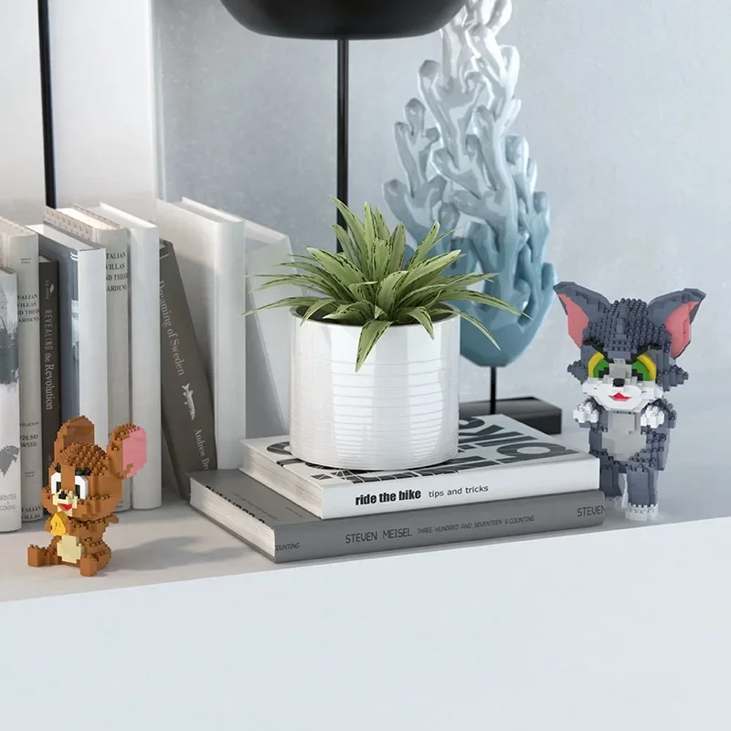 Tom dan Jerry blok bangunan mikro perangkap keju kucing dan Mouse 3D Model Anime Mini mainan figur bata untuk hadiah Natal