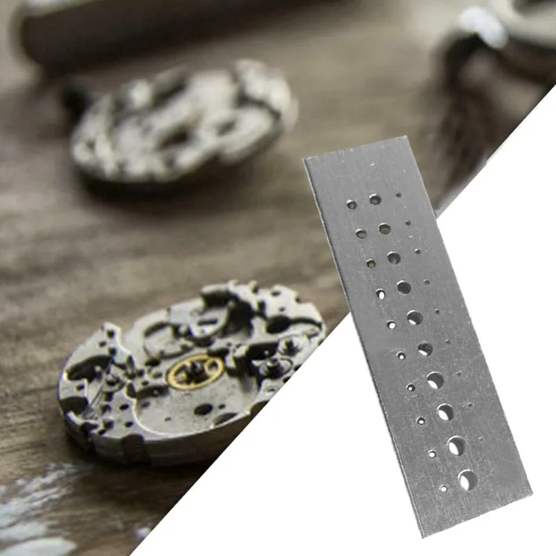Herramienta de estaca remachadora de acero inoxidable, bloque perforador de 30 agujeros, herramienta de reparación de joyeros, accesorios de relojero, herramientas de reparación, 1 ud.