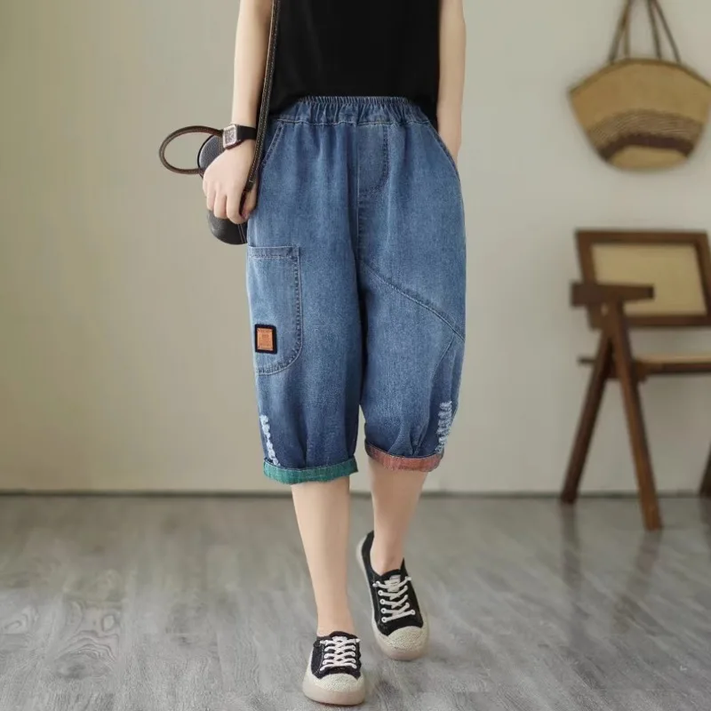 Celana Jeans Enam Titik Wanita Modis Celana Tengah Ukuran Besar Kasual Longgar Tipis Musim Panas Celana Wanita Pinggang Elastis Lubang Waed