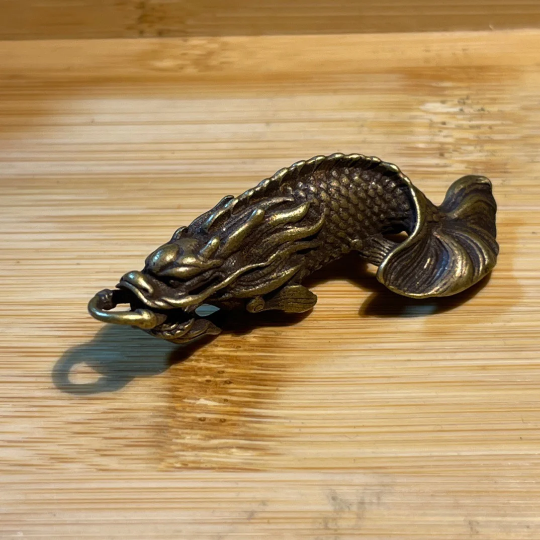 

Brass fish transformed into dragon, car keychain pendant, carp leaping dragon gate, attracting wealth, receiving blessings, drag