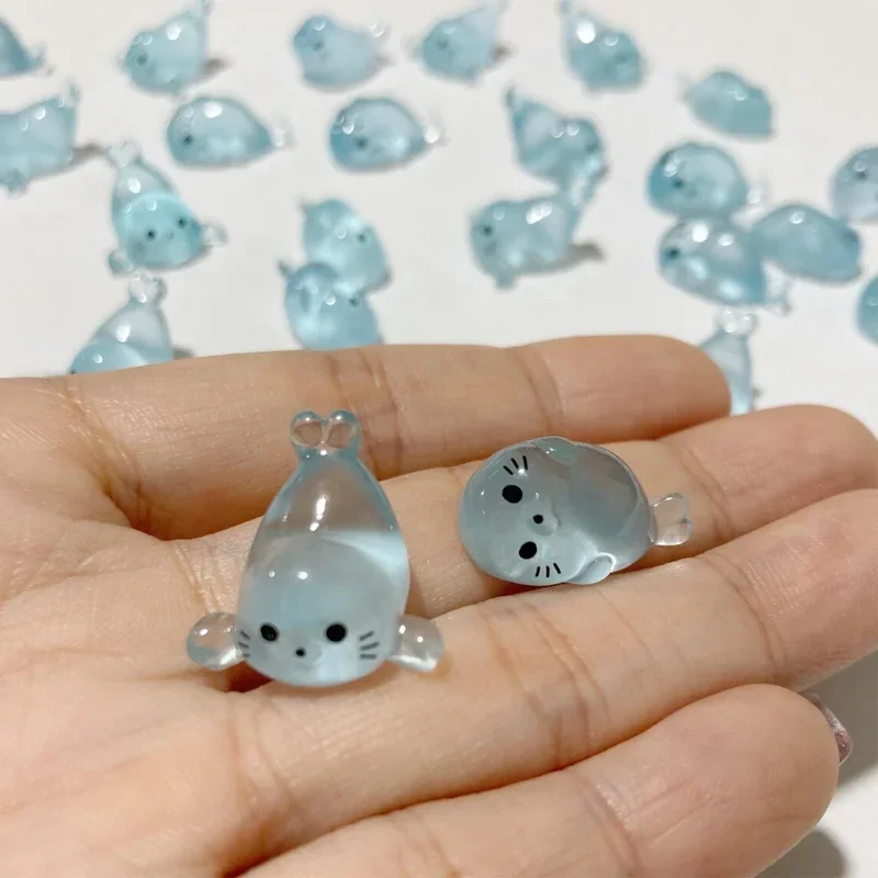 40 قطعة من تماثيل الختم الصغيرة المتوهجة في الظلام، منمنمات حيوانات البحر المضيئة من الراتنج، 4 أنماط لمستلزمات تزيين المنزل اليدوية ذاتية الصنع