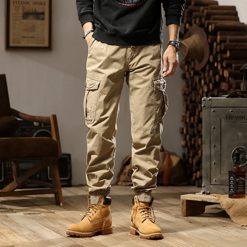 Celana Jogger Multi Saku Warna Solid Trendi Kasual Dasar Pria High Street Fashion Amerika Celana Kargo Pria Pakaian 2025