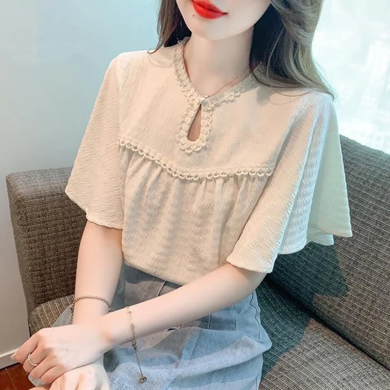 

Sweet O-Neck Hollow Out Spliced Folds Butterfly Sleeve Blouses Female Clothing 2024 Summer New Loose Chic Tops All-match Shirts