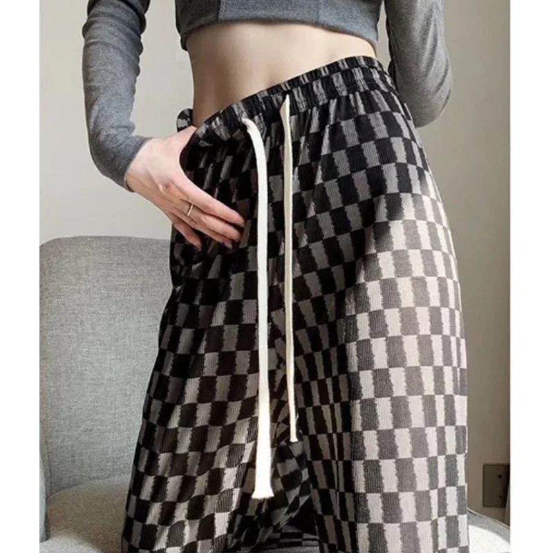 Pantalon en damier pour femme, noir et blanc, en soie glacée, cordon de serrage fin, poches, jambes larges, tendance, printemps été