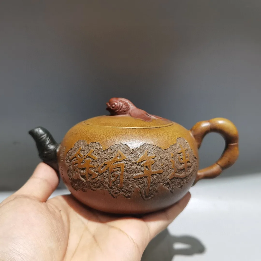 

7"Chinese Yixing Purple Clay Teapot Fish statue pot Engraving There are fish every year Kettle Teapot Flagon Gather fortune