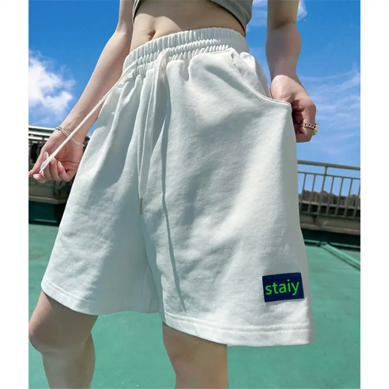 Pantaloni a cinque punte a gamba larga con coulisse a vita alta estiva colorata con dopamina Pantaloncini casual slim di grandi dimensioni da donna