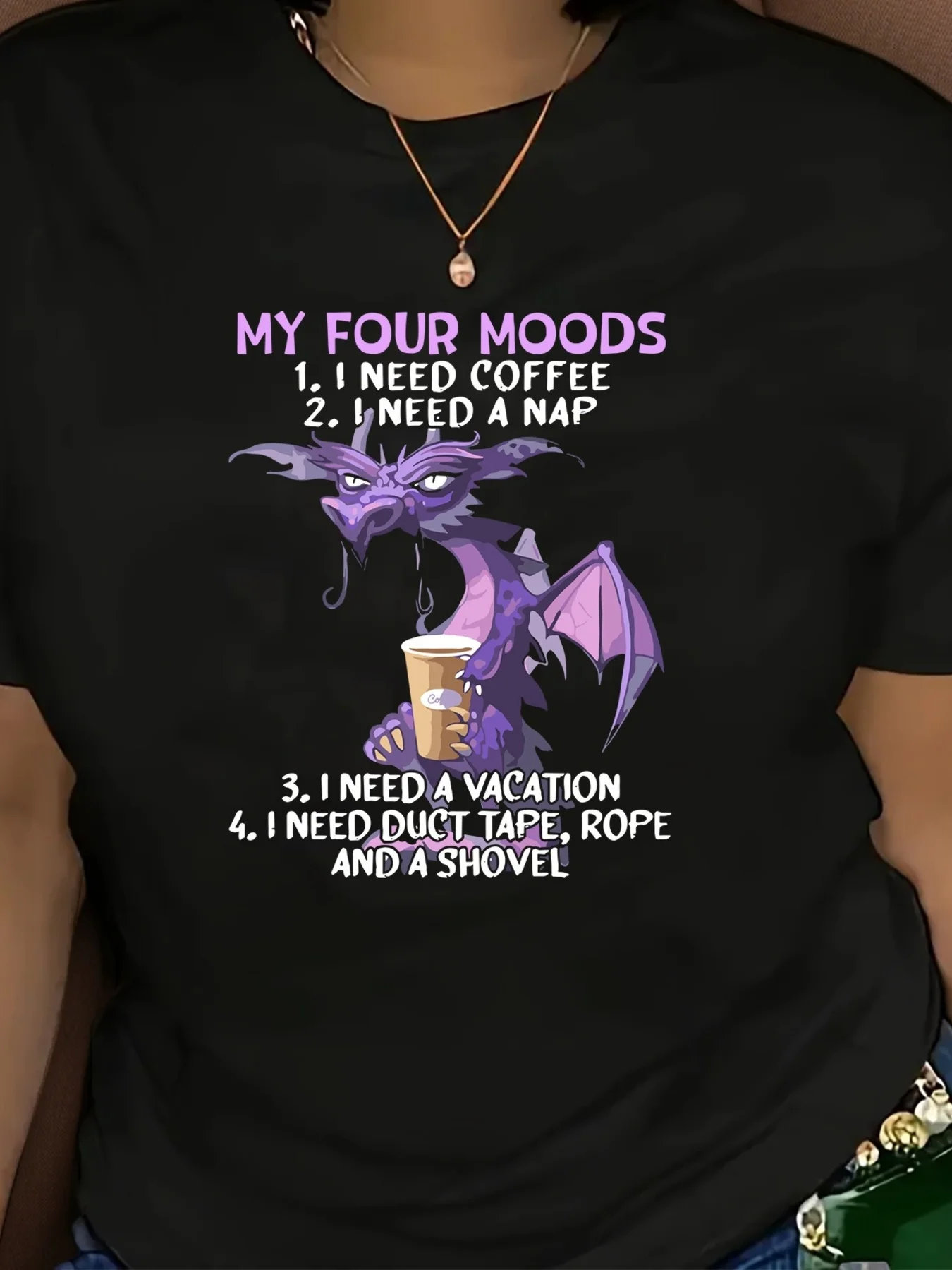 

Plus - Size Black Round Neck T - Shirt with Whimsical Dragon Print and 'My Four Moods' Humorous Quote: Quirky and Entertaining
