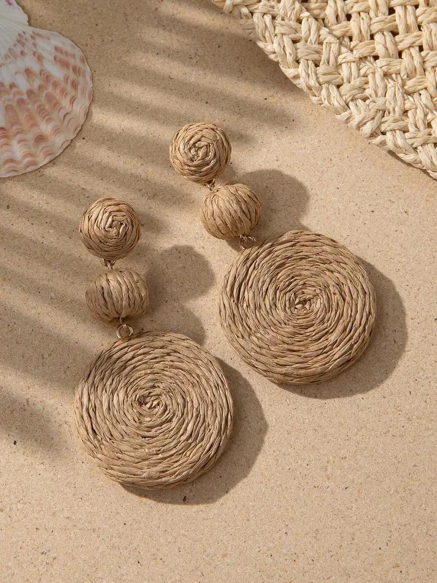 

Bohemian raffia round pendant earrings perfect for beach resort wear lightweight and stylish
