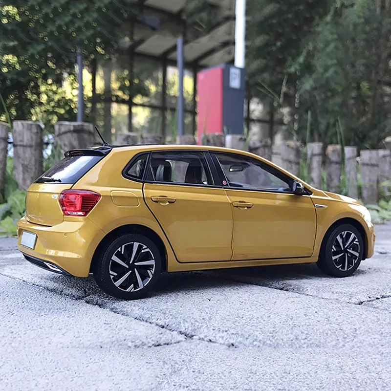 Original de fábrica 1:18 todo nuevo Polo Plus modelo de coche de aleación de nueva generación