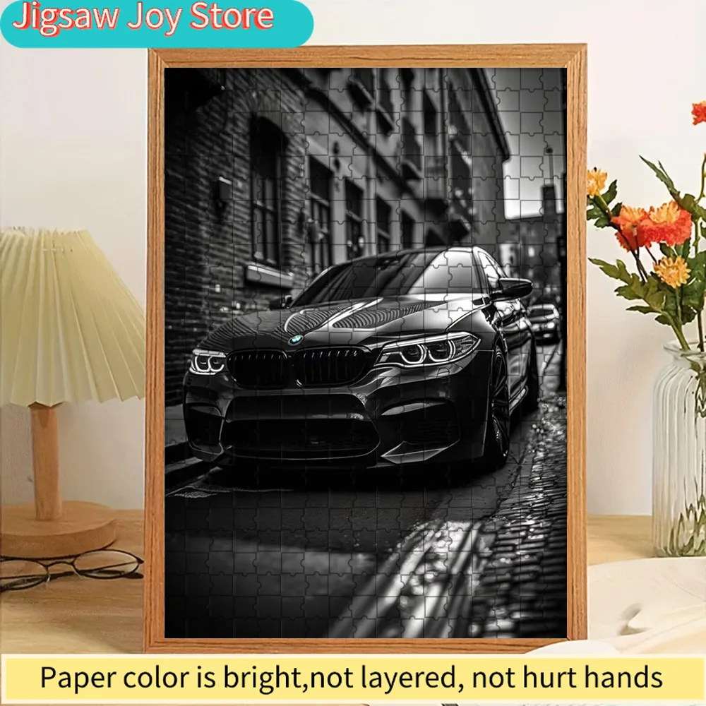 

Paper Jigsaw Puzzle Monochrome Black BMW M5 Sports Car with Wet Cobblestone Urban Street Scene Art Print Wall Decor Modern Germa