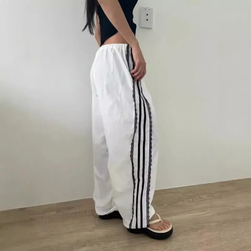 

2025 Early Autumn Fashion New Korean Ins Side Lace Lace Stitching Sports Retro Casual Loose Pants Female Clothing