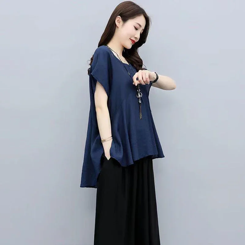 Camisa holgada de manga corta de Color sólido de gran tamaño, Tops versátiles con temperamento informal para cubrir el vientre, ropa de moda para mujer