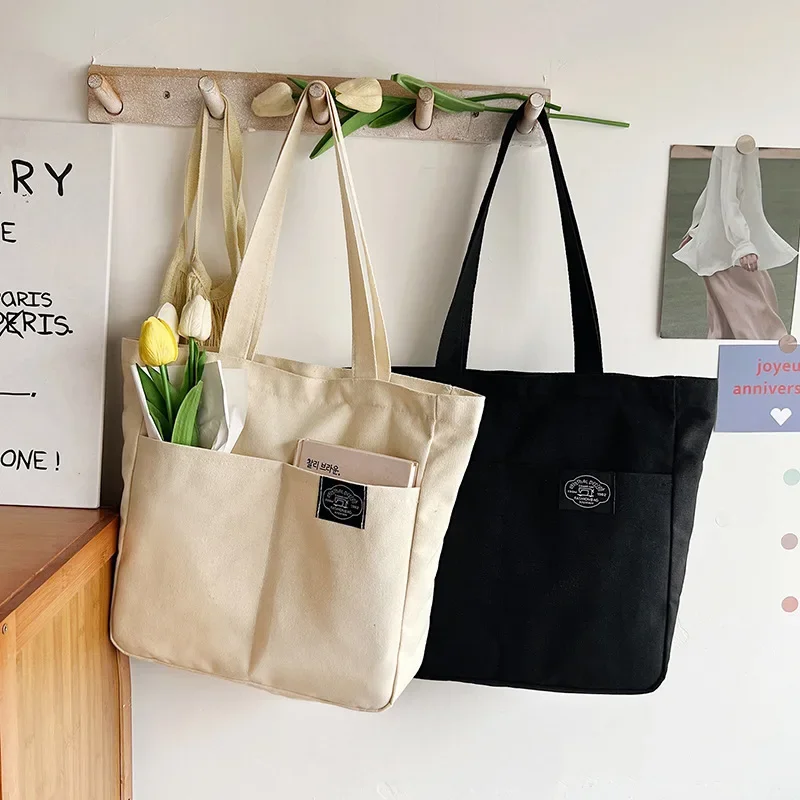 

2024 Spring/summer Canvas Bag Female Solid Color Simple Large Capacity Shoulder Bag Foreign Trade Hand Shopping Bag