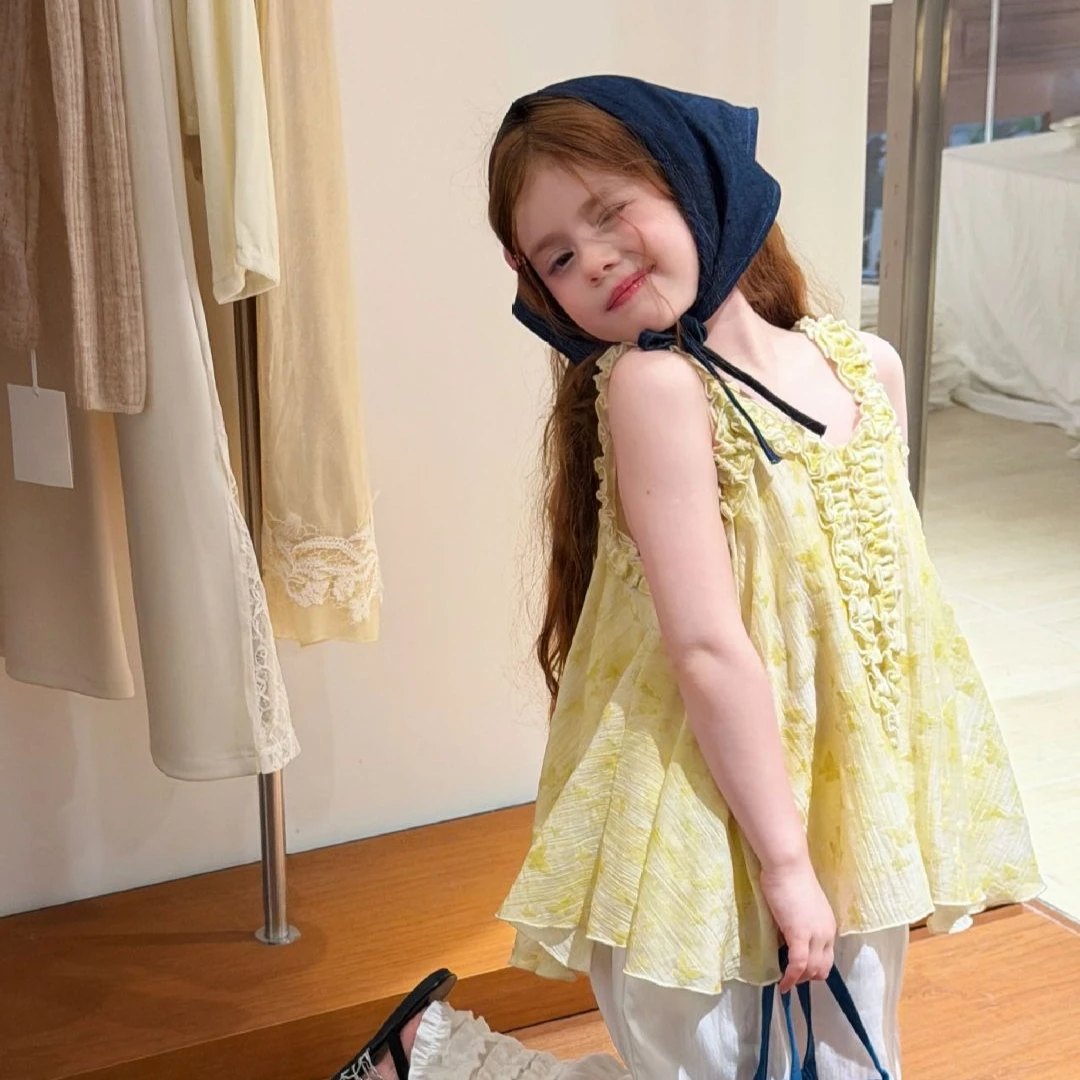 

Girls Blouse 2026 Spring and Summer New Childrens Clothing Korean Wind Girl Baby Sweet Wooden Ear Edge Design Sense Suspender