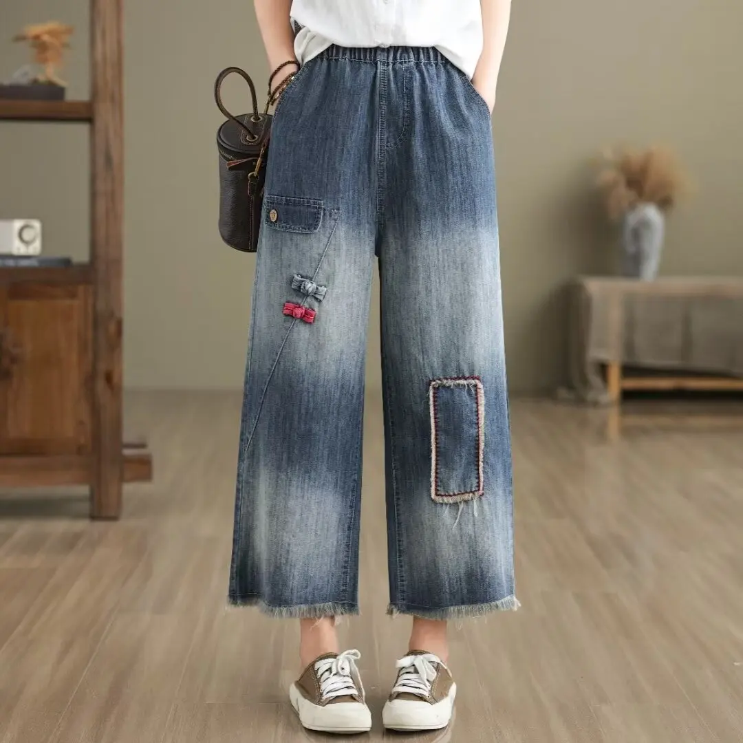 Aricaca damska wysoka talia naszywka z szerokimi nogawkami projektuje spodnie M-2XL modne spodnie dżinsowe z haftem