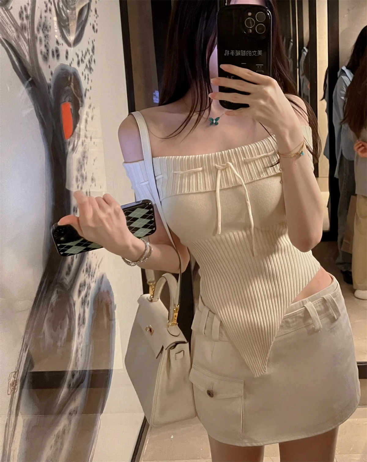 

Комплект: джинсовая юбка с низкой талией, вязаный топ, брюки с защитой от просвечивания, однотонная система цветов, цвет Egg Roll, 65 OW, мягкий деним.