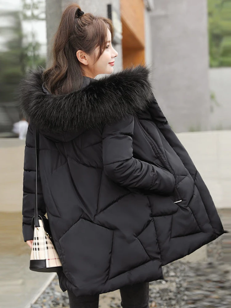 Parkas holgadas coreanas para mujer, chaqueta acolchada de algodón de longitud media con capucha para invierno, abrigo para mujer con cuello de piel sintética, chaqueta gruesa y cálida, novedad de 2025