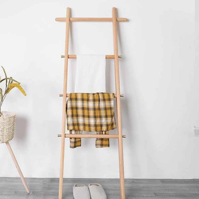 

Trapezoidal rack Nordic homestay floor-to-ceiling hanger bedroom bathroom clothes solid wood against the wall stairs towel rack