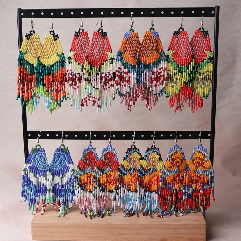 Beaded earrings Rose Symmetry Bohemia Hand knitting Alloy Three flowers Originality Design Simple Tassel Rice bead earrings