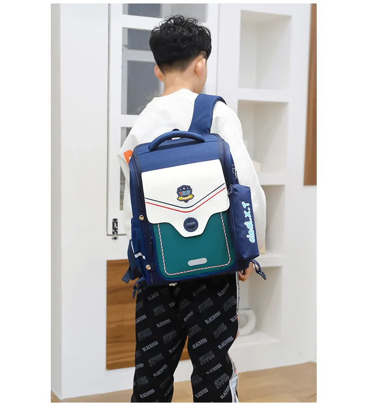 Mochila con colgante de astronauta para niños, bolso escolar ortopédico de nailon impermeable con estuche para lápices, gran capacidad