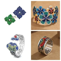 A retro-style hollowed-out blue lotus lock ring with a fashionable open ring featuring blue enamel craftsmanship
