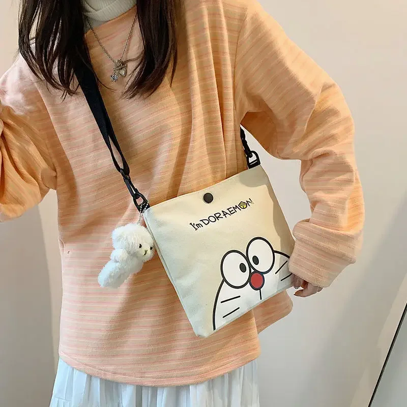 Sac à bandoulière en toile imprimée dessin animé Doraemon, sac à bandoulière, sac de rangement, cadeau, robot chat mignon, populaire