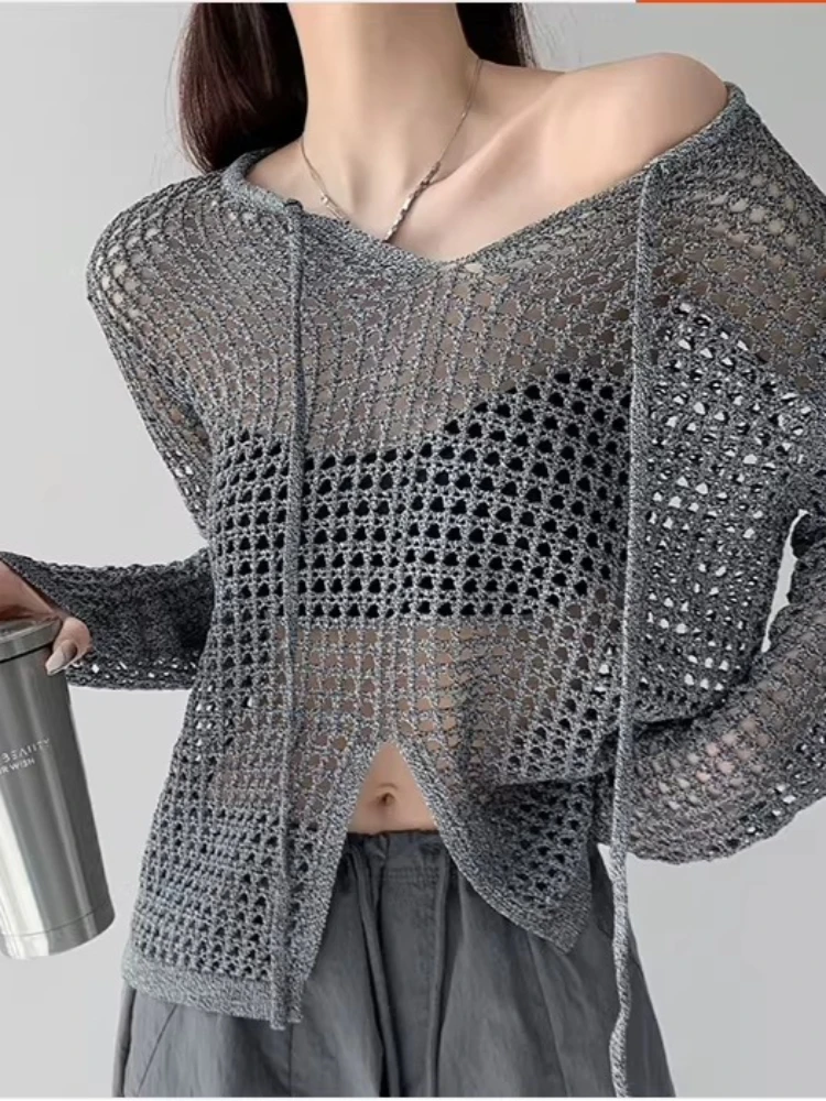Damen 2026 Frühling Sommer Neu Lockerer Aushöhlter Strick-Langarm-Oberteil mit Schlitz Sonnenschutz-Cover-Up Lässiges Mode-T-Shirt