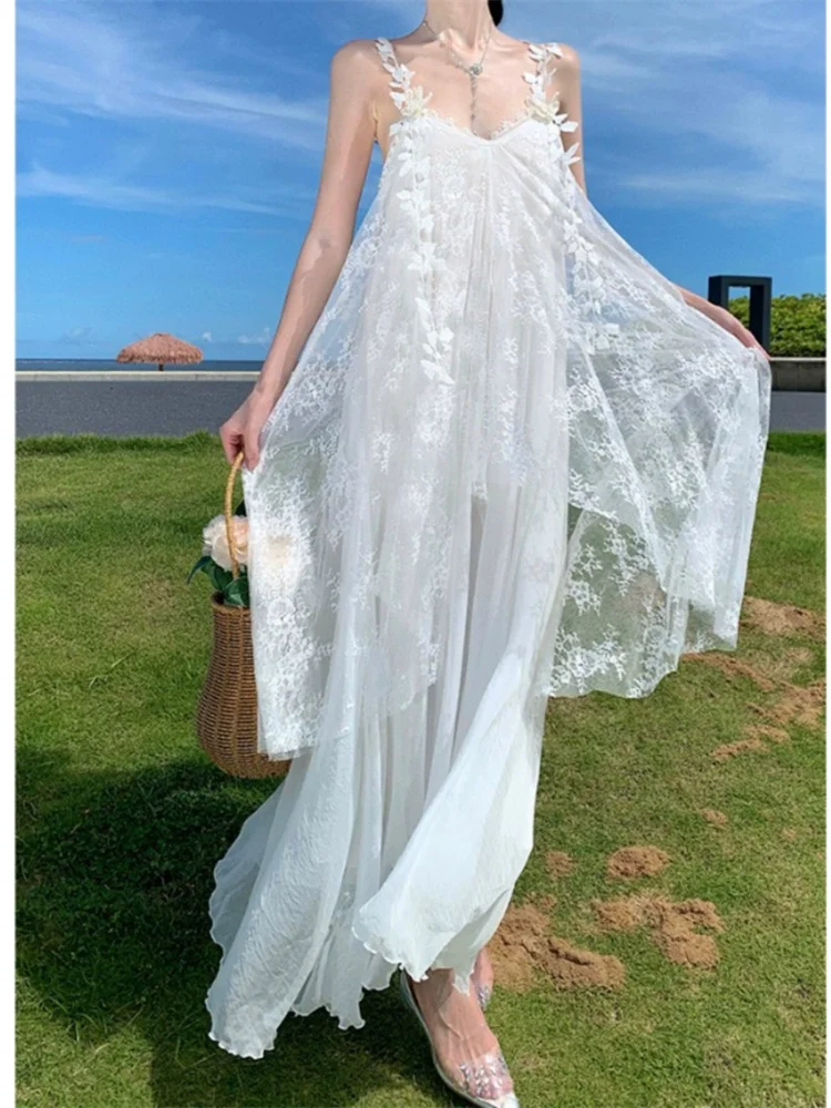 Robe de plage blanche Style Boho féerique pour femmes, maille brodée, bretelles papillon, longue robe en dentelle, sans manches, ample, vacances