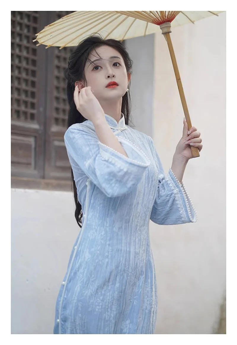 Cheongsam azul de estilo chino de Año Nuevo para mujer, vestido largo Vintage mejorado de alta moda, Qipao Simple de manga larga S2695 2024