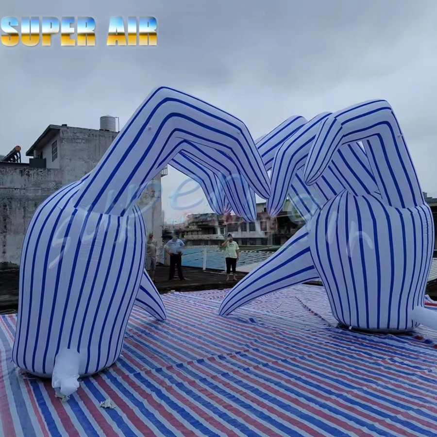 Arco inflable modelo de mano vívida de diseño innovador con iluminación LED colorida para fondo de escenario