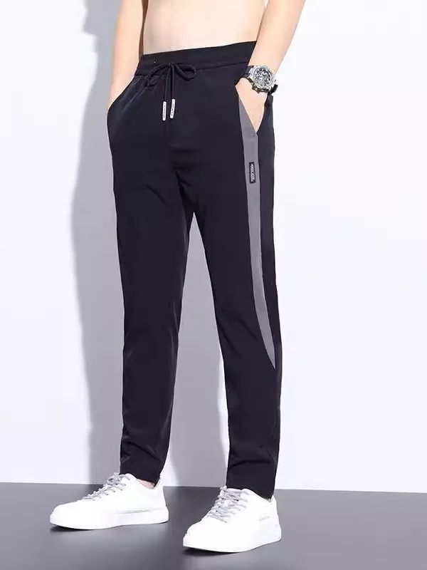 Pantaloni sportivi casual in seta di ghiaccio Pantaloni sportivi traspiranti nuovi estivi da uomo Pantaloni larghi da lavoro larghi Gamba dritta a vita alta sottile