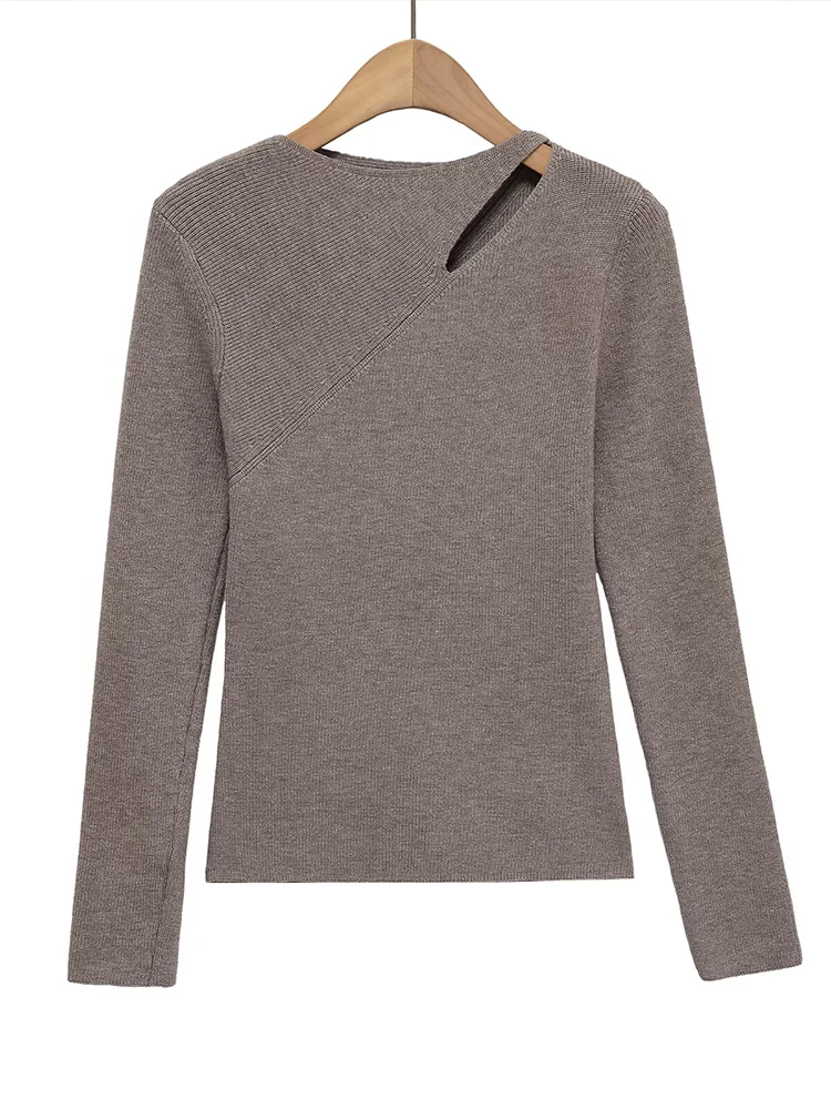 

European style new women's fashion versatile temperament solid color design hollow short long-sleeved sweater