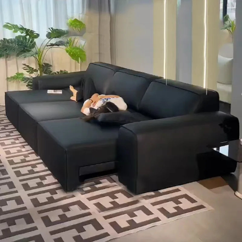 

Big black cow, real cowhide, against the wall, electric, functional, sofa, living room, retractable