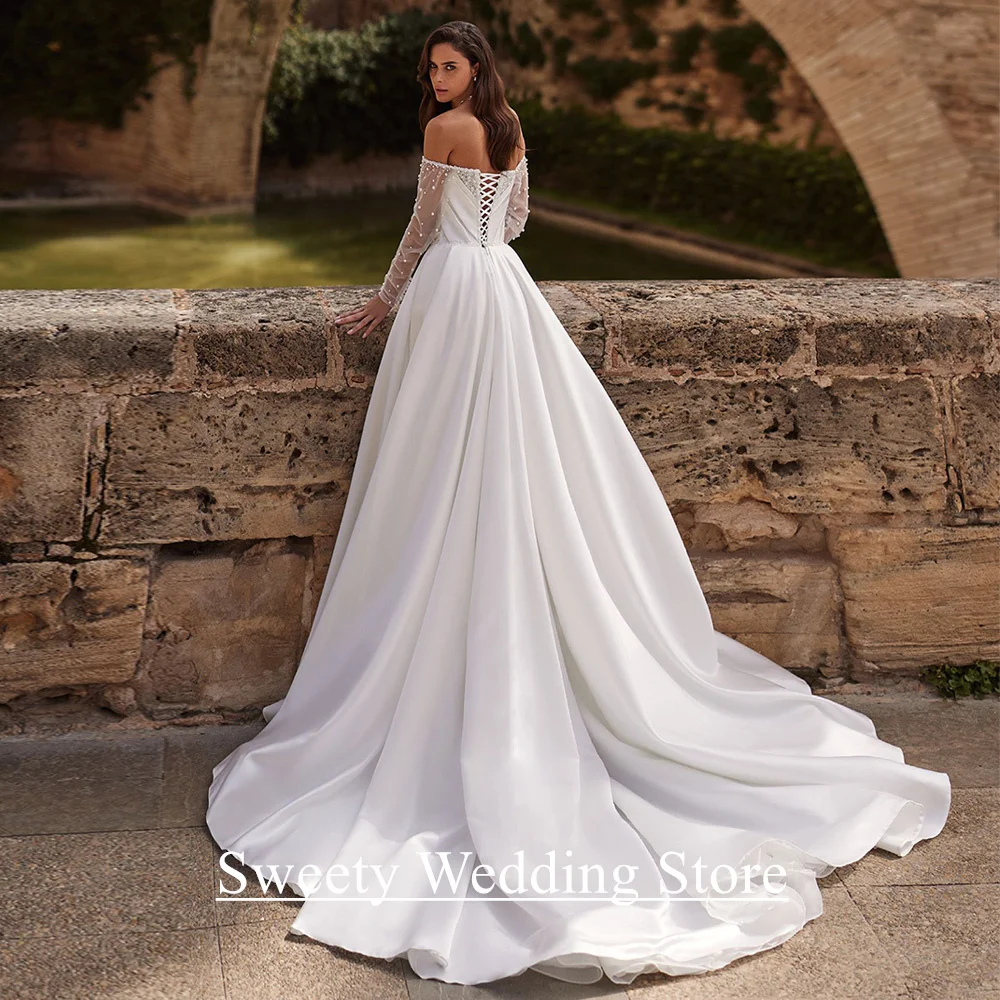 فستان زفاف أنيق مخصص الحبيب كم كامل الديكور اللؤلؤ عالية الشق قطار الاجتياح امرأة العروس ثوب الزفاف