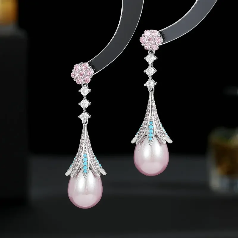 

French retro elegant temperament light luxury high sense long modified face water drop pearl earrings