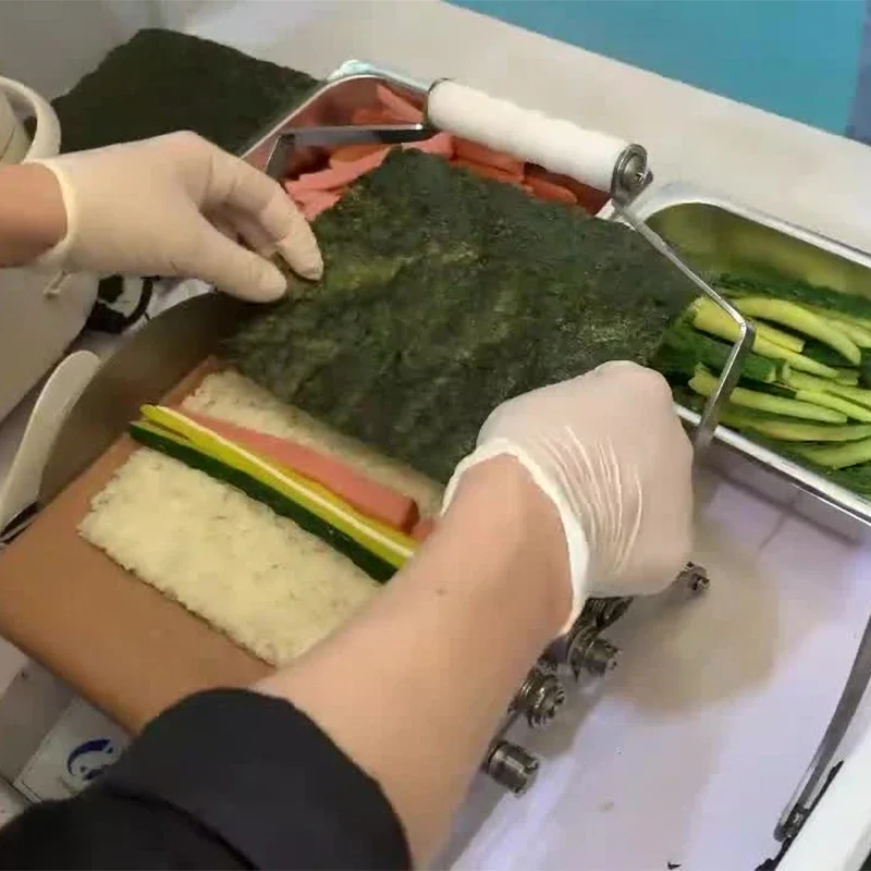 เครื่องทำซูชิแบบลูกบอลสำหรับแบบใช้มือข้าวเชิงพาณิชย์เครื่องทำซูชิแบบม้วน JM50ร้านทำซูชิ