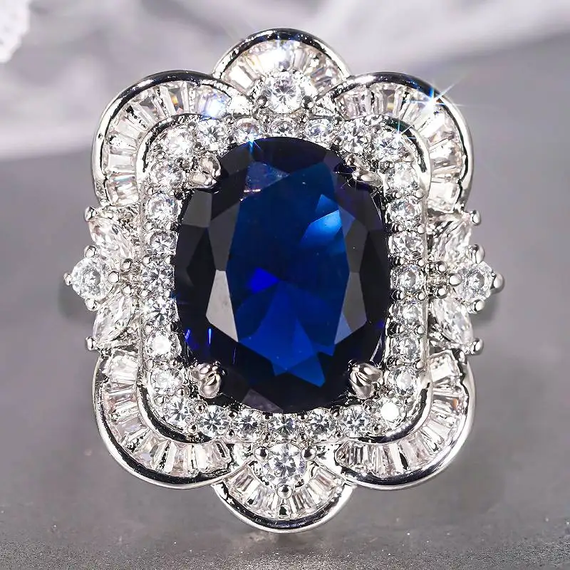 Huitan Damen-Ring mit eingelegtem funkelndem blauen Zirkonia, elegante Hochzeit, Verlobung, Accessoires, modischer Luxus-Schmuck für Party
