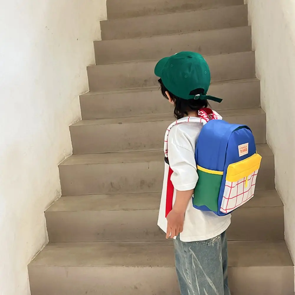 حقيبة كتب شخصية بألوان متباينة منقوشة حقيبة ظهر ذات سعة كبيرة من النايلون للأطفال حقيبة مدرسية على الطراز الكوري حقيبة كتف لطيفة