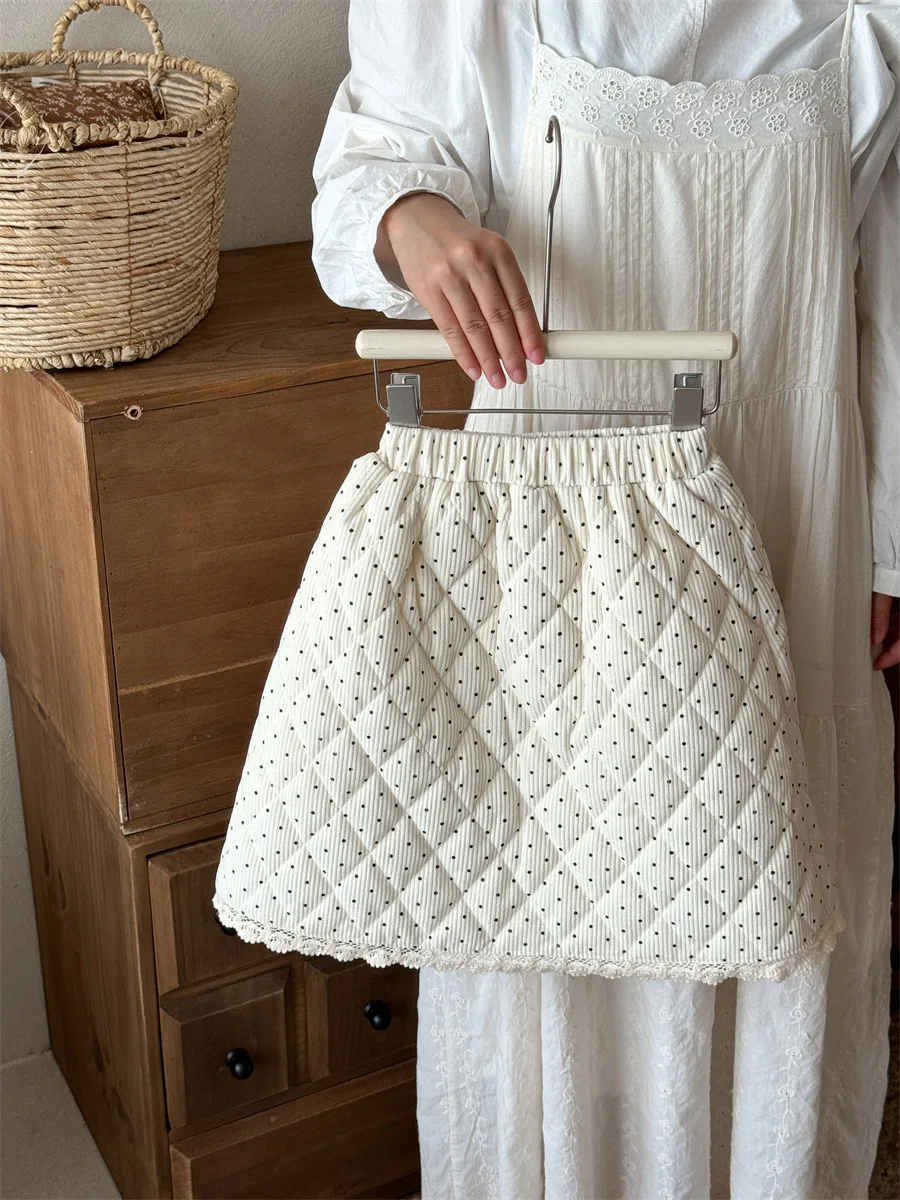 الفتيات نصف طول تنورة 2025 شتاء منتج جديد الطبعة الكورية موجة غربية نقطة الترفيه تنوعا نصف طول تنورة الخصر