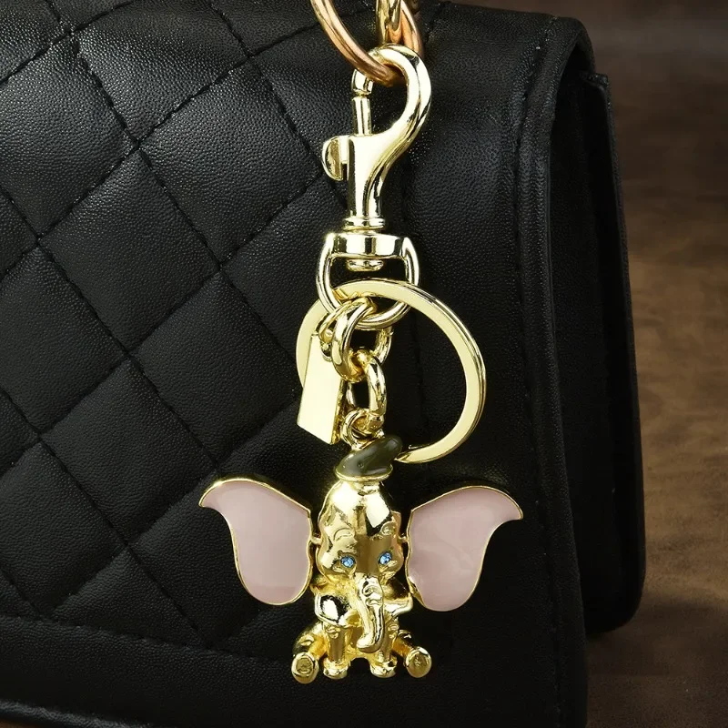 المعلقات على الحقيبة، سلاسل مفاتيح السيارة، آذان لطيفة، المعلقات المتحركة، سلاسل المفاتيح الكرتونية المعدنية Dumbo