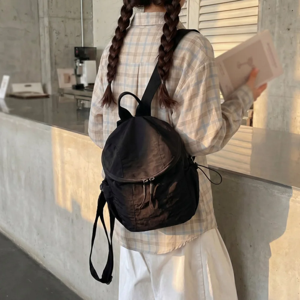 Mochila con cordón minimalista negra de estilo coreano, mochila informal ligera de nailon, para compras diarias y salidas informales