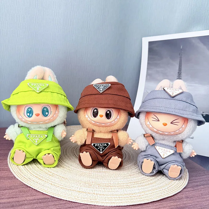 O conjunto de calças de macacão de triângulo invertido com pingente de roupas de pano La de primeira, segunda e terceira geração é popular.