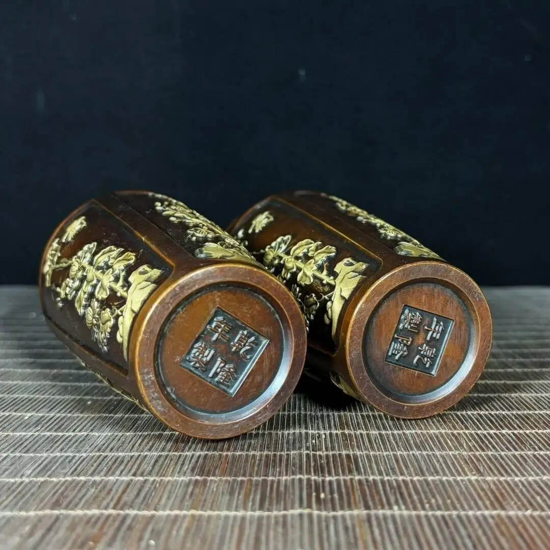 A Pair Of Pure Copper Gilded Vases With Plum, Orchid, Bamboo, And Chrysanthemum Designs